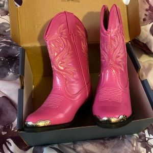 A pair of pink boot for a little girl size 8